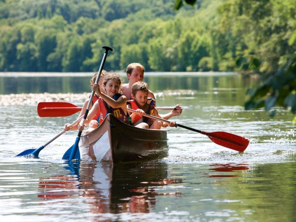 Kayaking on the Dordogne River in La Roque-Gageac" for an image of kayaking.