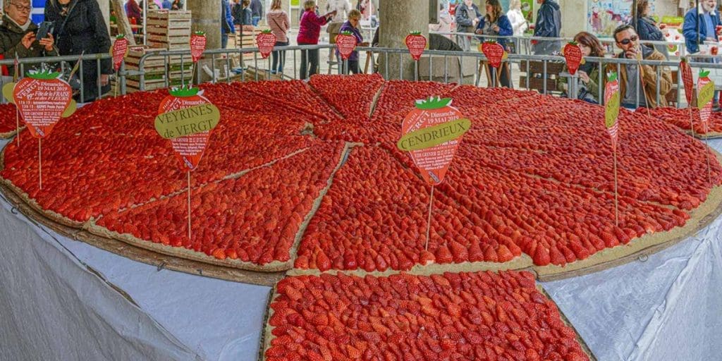 Giant strawberry tart at the Fête de la Fraise in Beaulieu-sur-Dordogne