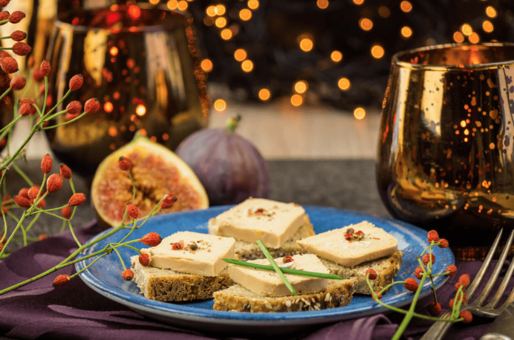 Bloc de foie gras served with bread, a traditional French holiday dish