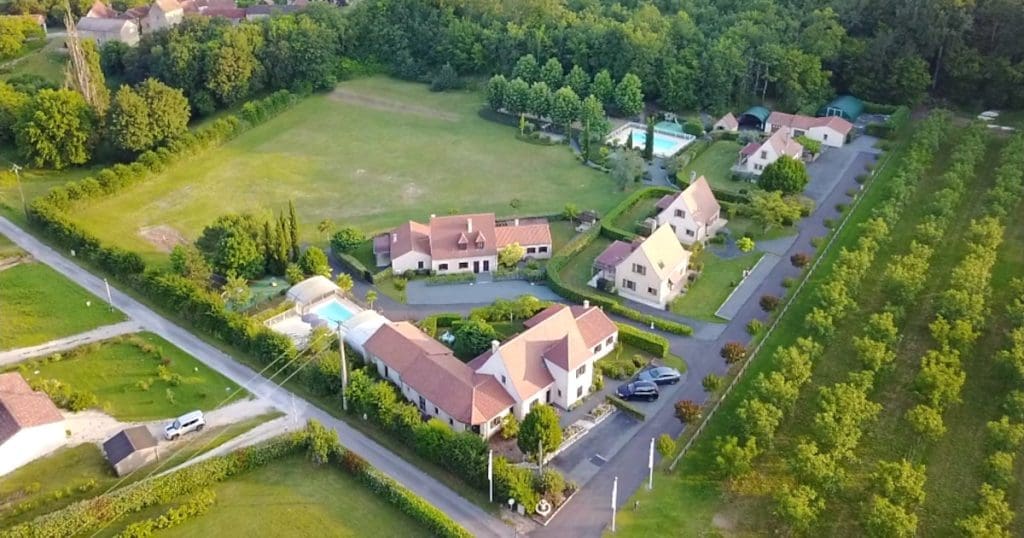  Large holiday park with greenery and trampoline